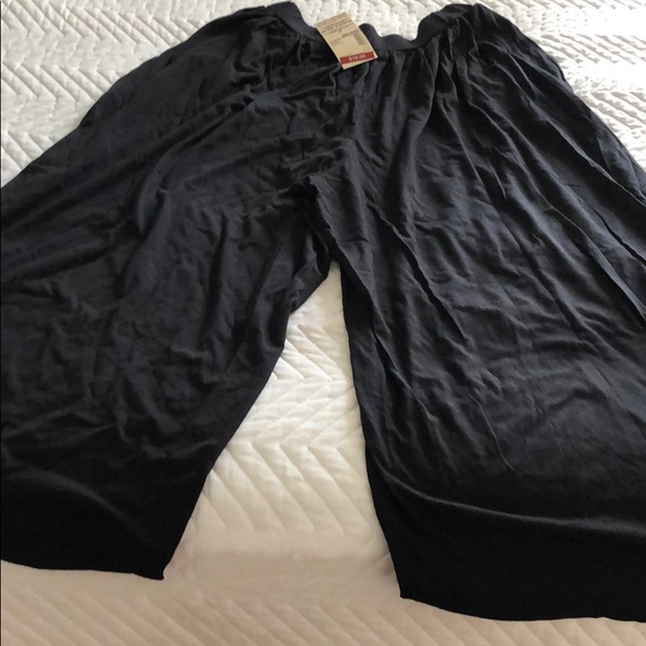 Muji black flare pants